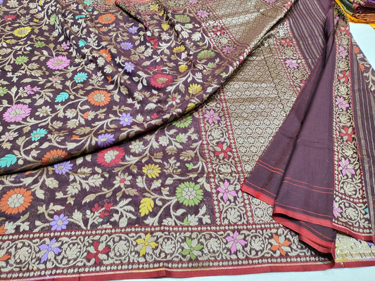 Floral patterned fabric with a focus on intricate designs and colors.